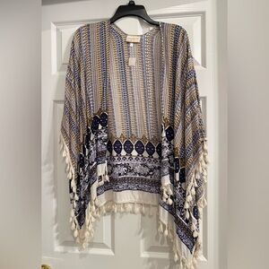 New Kimono wrap with tassel hem. One Size. New with tag.